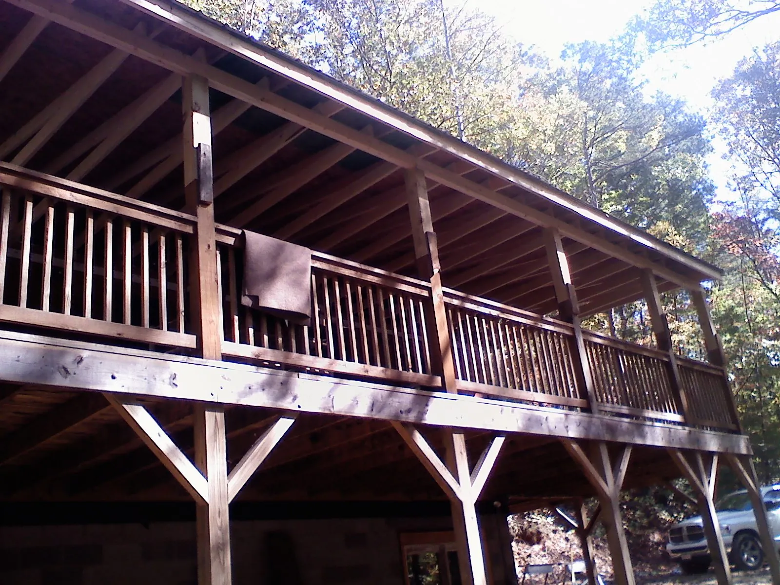 Timber framing under a new elevated porch and deck — Roof Leak Repair in Colbert by Roofing Brothers